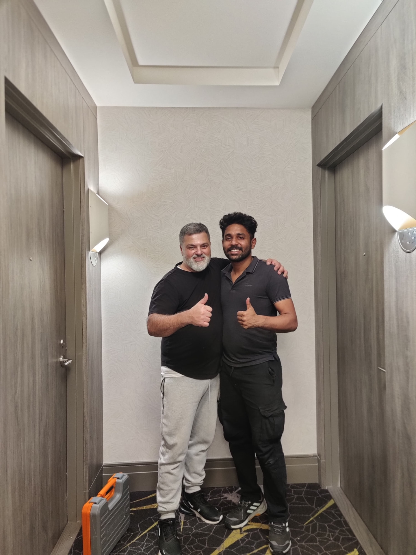 Acemovers crew member with a customer after a completed move